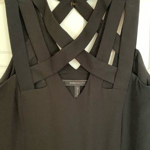 BCBG black criss cross top with clasps on back.